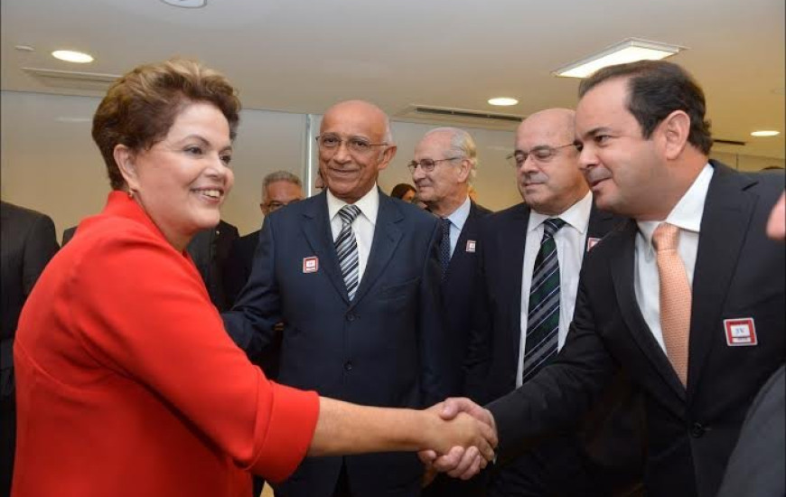 Roberto Pires em evento com Dilma