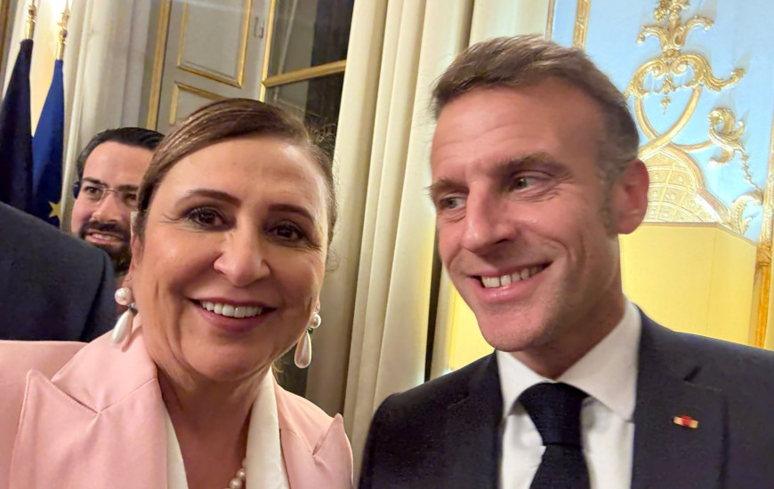 Kátia e o presidente francês, Emmanuel Macron na manhã desta quinta, 27